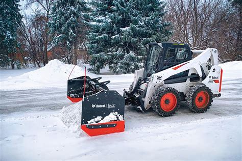 bobcat skid steer snow removal|enclosed cab snow moving equipment.